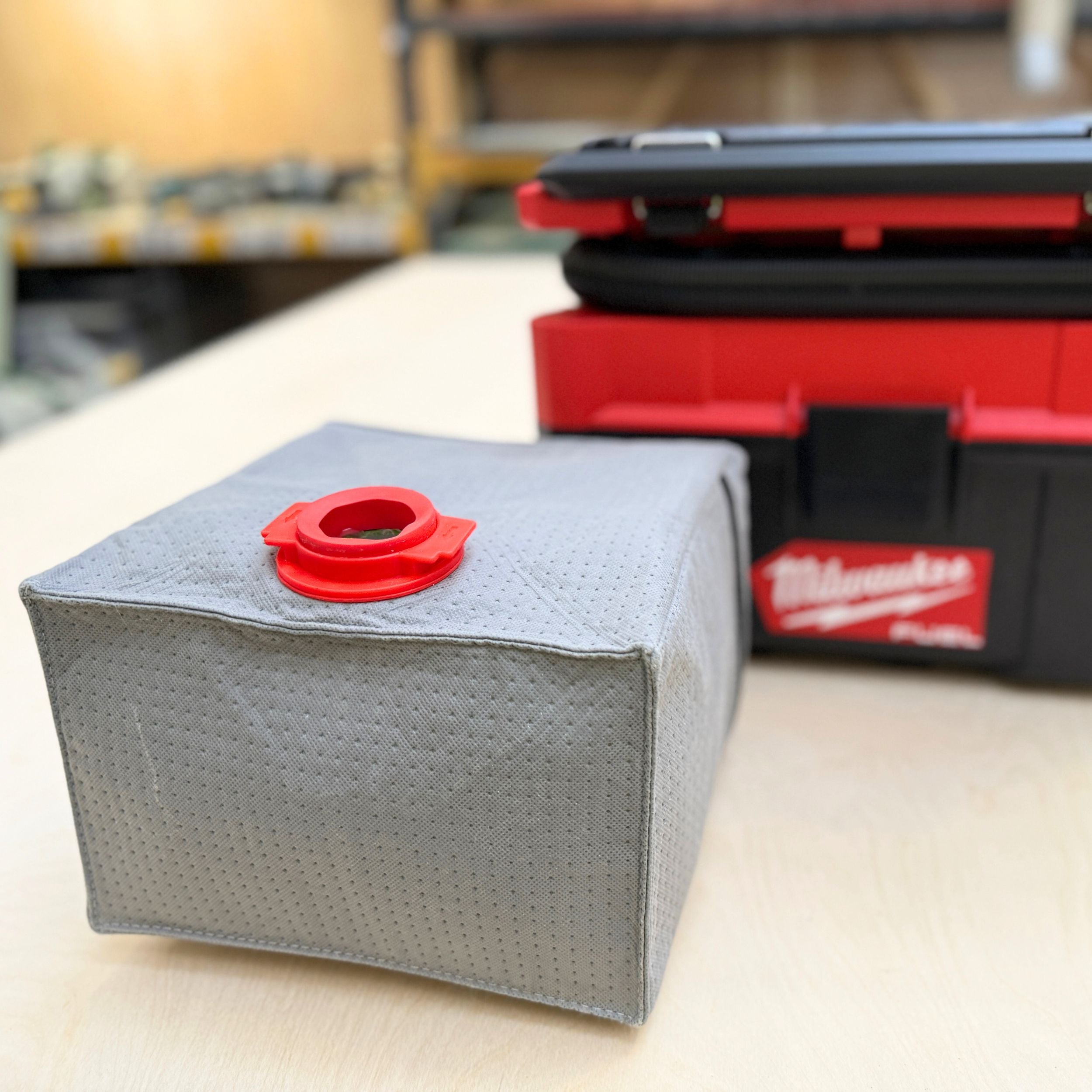 Reusable dust bag for Milwaukee M18 Fuel Packout fitted inside the vacuum