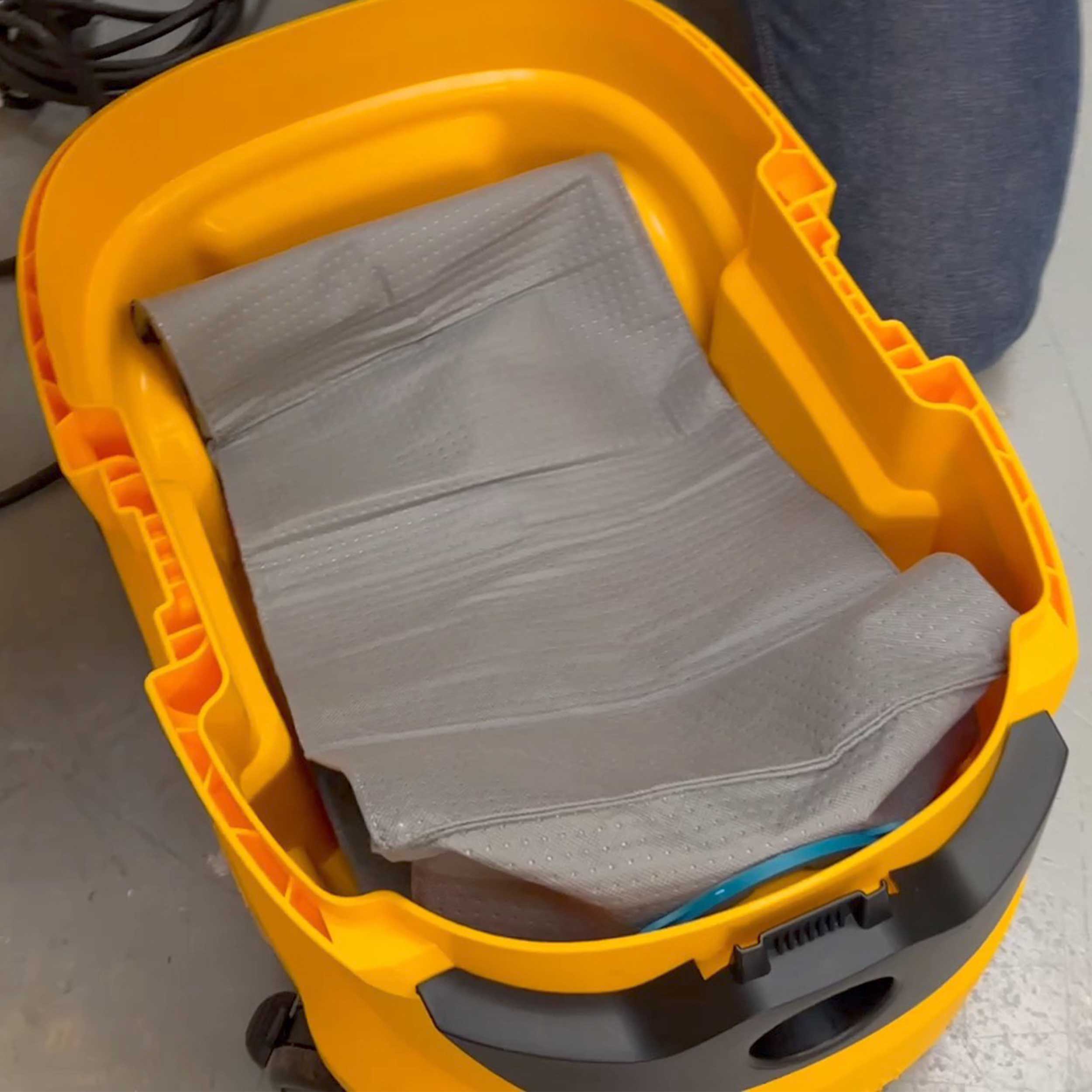 Reusable dust bag for Mirka 1230 LM shown with dust extractor accessories